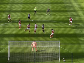 A general view of the action as the shadow lengthens across the pitch during the Premier League match (Photo by Stu Forster/Getty Images)