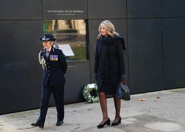 Dame Cressida Dick (left) with Sgt Ratana’s partner Su Bushby (right) at the National Police Memorial. Photo: Getty