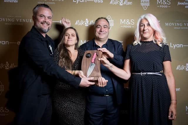 Refugee Community Kitchen founders Sam Jones, Paula Gallardo, Steve Stavrinides and Janie Mac with their award. Credit: RCK