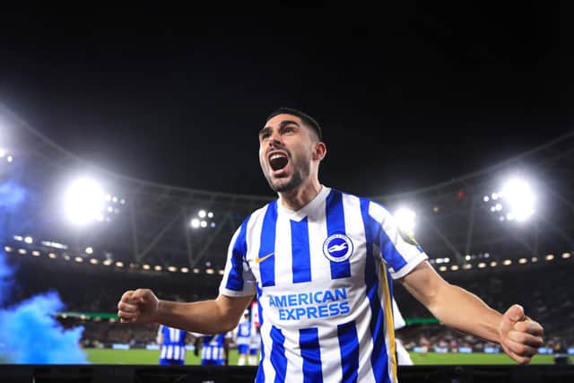 Neal Maupay of Brighton celebrates after scoring his sides first goal during the Premier League match between West Ham United and Brighton & Hove Albion at London Stadium. Credit: Alex Pantling/Getty Images