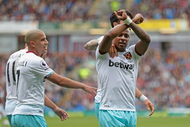 Andre Ayew of West Ham United celebrates scoring   (Photo by Mark Robinson/Getty Images)