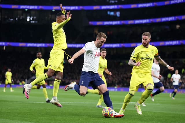  Harry Kane of Tottenham Hotspur is closed down by Rico Henry  (Photo by Julian Finney/Getty Images)