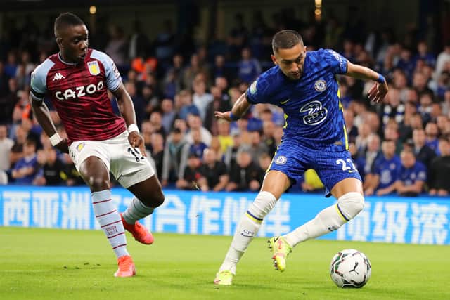 Hakim Ziyech of Chelsea is challenged by Marvelous Nakamba of Aston Villa during the Carabao Cup (Photo by James Chance/Getty Images)