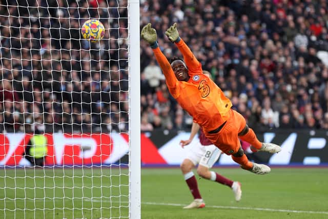 Edouard Mendy of Chelsea fails to save a shot from Arthur Masuaku of West Ham United (Photo by Alex Pantling/Getty Images)