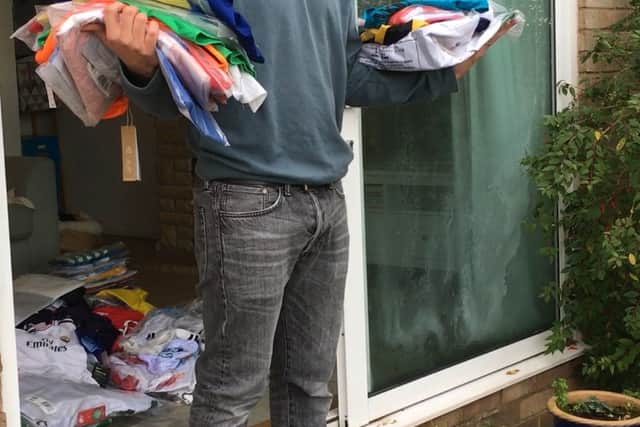 Paul Watson with kits collected for Kitmas. Credit: Paul Watson