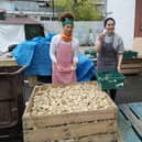 LondonWorld reporter Lynn Rusk, right, volunteering at the Refugee Community Kitchen. Credit: Lynn Rusk