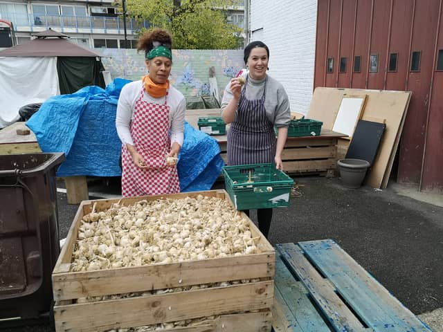 LondonWorld reporter Lynn Rusk, right, volunteering at the Refugee Community Kitchen. Credit: Lynn Rusk