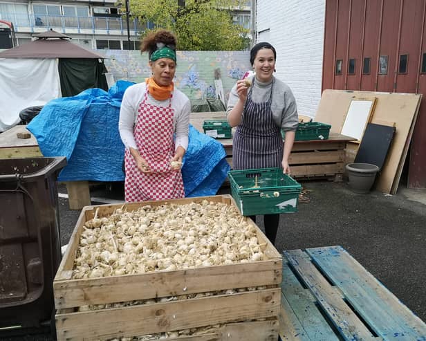 LondonWorld reporter Lynn Rusk, right, volunteering at the Refugee Community Kitchen. Credit: Lynn Rusk