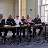 From left: Thomas Walgate and Sarah Sak, Anthony Walgate’s parents; Adam and Amanda Whitworth, father and stepmother of Daniel Whitworth; Neil Hudgell, solicitor; Jenny and Donna Taylor, sisters of Jack Taylor. In back row from right: Colin Taylor, Jeanette Taylor, parents of Jack Taylor, and Donna’s partner, Andy Ireland. Photo: LondonWorld