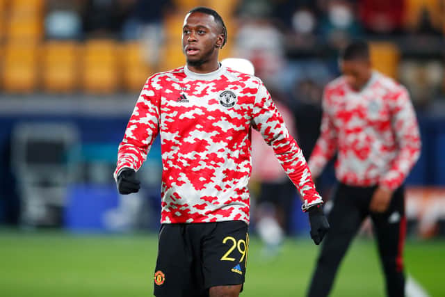 Aaron Wan-Bissaka of Manchester United looks on as he warms up prior to the UEFA Champions (Photo by Eric Alonso/Getty Images)