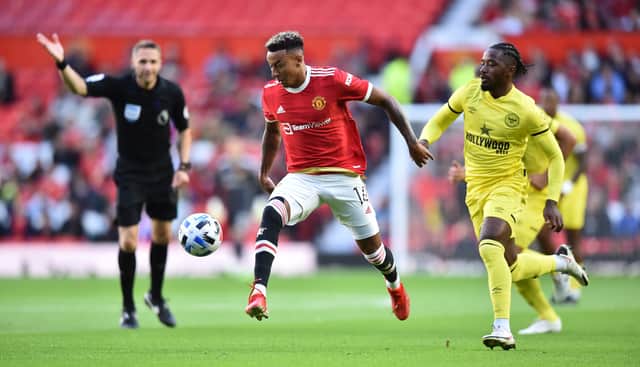 Jesse Lingard of Manchester United runs past Tarique Fosu-Henry of Brentford during the pre-season (Photo by Nathan Stirk/Getty Images)