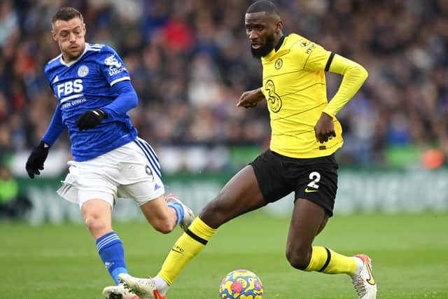Antonio Ruediger of Chelsea battles for possession with Jamie Vardy of Leicester City (Photo by Michael Regan/Getty Images)