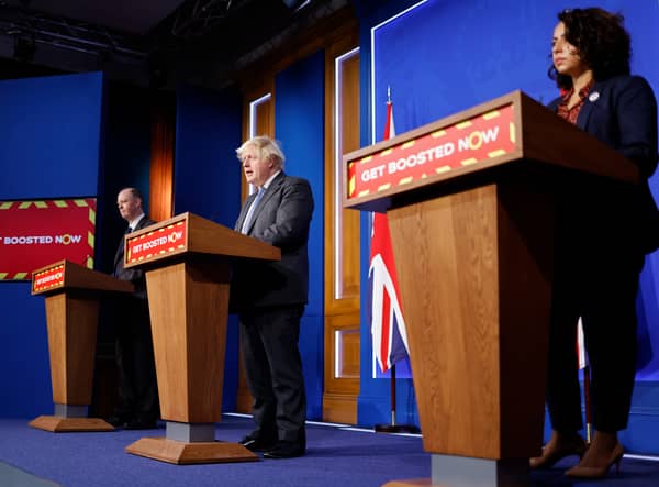 Prime minister Boris Johnson (centre), chief medical officer for England Professor Chris Whitty (left) and director of primary care for NHS England Dr Nikki Kanani (right). Photo by Tolga Akmen - WPA Pool/Getty Images