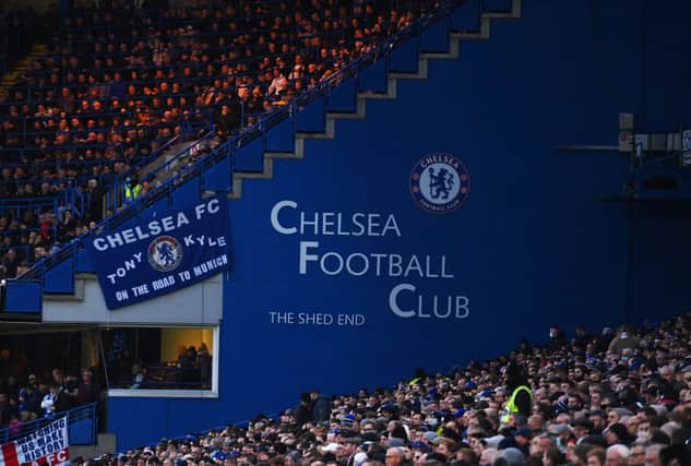 Chelsea fans, top left, in the Shed End which has been prepared for safe standing. Credit: Mike Hewitt/Getty Images