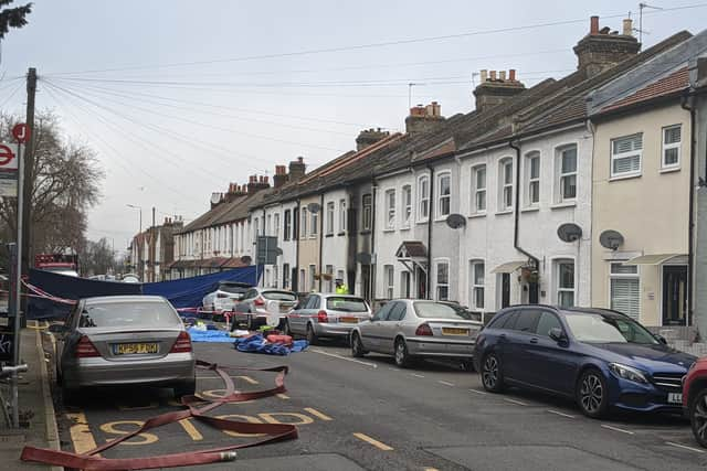 Police work at the scene where four young boys have died in a fire. Credit: Lynn Rusk