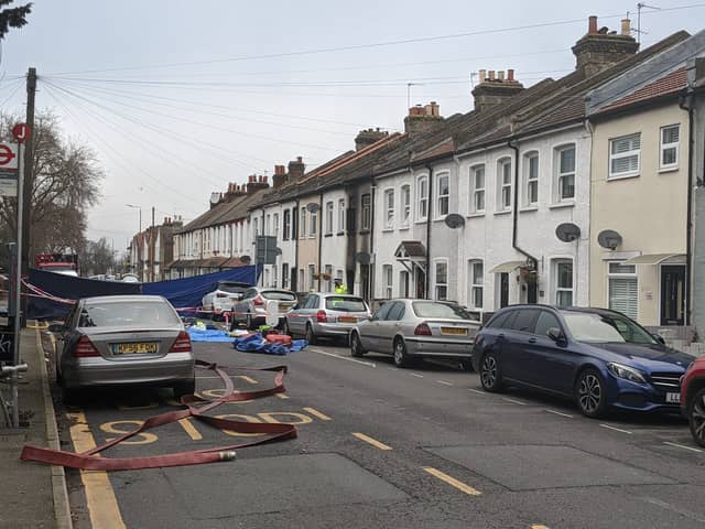 Police work at the scene where four young boys have died in a fire. Credit: Lynn Rusk