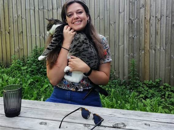 Journalist Lucy Harley-McKeown with cat Lola. Photo: Supplied