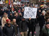 ‘Freedom march’ protestors against vaccines, vaccine passports, lockdowns march near Victoria Station on December 18. Credit: Hollie Adams/Getty Images