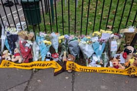 Tributes left to the four boys who died in a fire in Sutton. Photo: Lynn Rusk