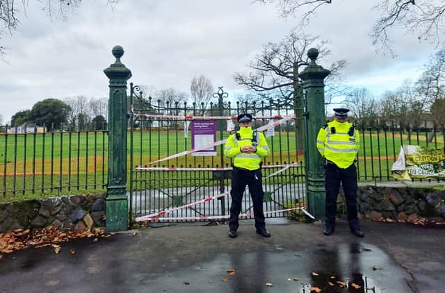 Floral tributes and police at Ashburton Park, Croydon.  December 31, 2021.  The fatal stabbing of a 15-year-old boy has taken the number of teenagers murdered in London in 2021 to the highest level for 13 years. Credit: Joe Morgan / SWNS