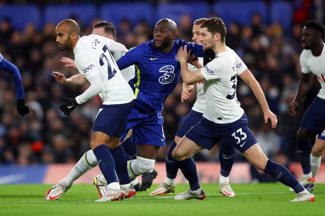  Romelu Lukaku of Chelsea tangles with Lucas Moura and Ben Davies of Tottenham Hotspur  (Photo by Marc Atkins/Getty Images)