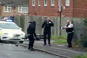 Shocking video shows a man attacking a police officer with a foot-long knife while resisting arrest. Credit: Robert Ball / SWNS