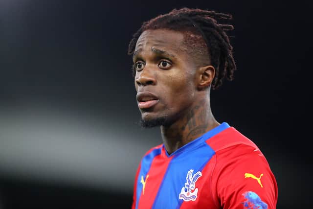 Wilfred Zaha of Crystal Palace looks on during the Premier League match  (Photo by Chloe Knott - Danehouse/Getty Images)