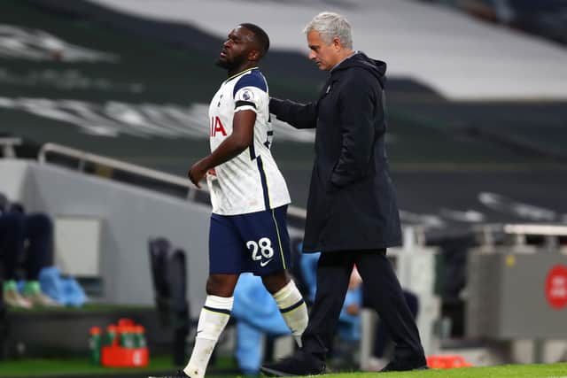  Jose Mourinho, Manager of Tottenham Hotspur with Tanguy Ndombele  (Photo by Clive Rose/Getty Images)