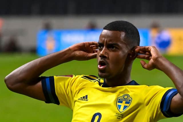 Sweden’s forward Alexander Isak celebrates scoring the 1-1 equaliser during the FIFA World Cup Qatar 2022 qualification Group B football match between Sweden and Spain, at the Friends Arena in Solna, Sweden on September 2, 2021. 