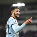 Said Benrahma of West Ham United picks up a lighter that was thrown onto the pitch (Photo by Marc Atkins/Getty Images)