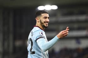 Said Benrahma of West Ham United picks up a lighter that was thrown onto the pitch (Photo by Marc Atkins/Getty Images)
