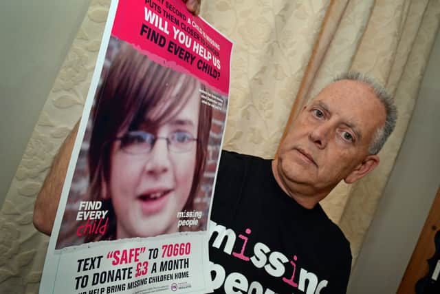 Kevin Gosden, pictured with missing leaflets and posters featuring his son Andrew, who has been missing for 14 years. Credit: Doncaster Free Press / SWNS.com