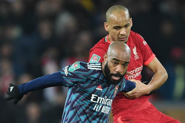 Liverpool midfielder battles Arsenal’s Alex Lacazette. Picture: Stuart MacFarlane/Arsenal FC via Getty Images