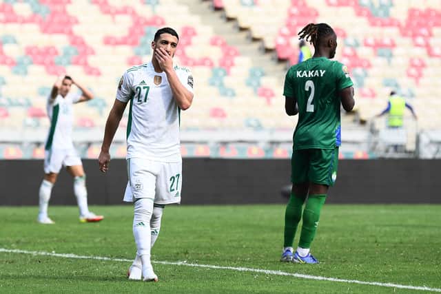 Said Benrahma (L) and Sierra Leone’s defender Osman Kakay (R) react after a draw  (Photo by CHARLY TRIBALLEAU/AFP via Getty Images)