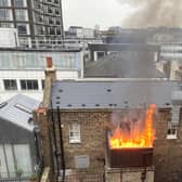 Photos shows the moment Guy Ritchie’s London pub Lore of the Land burst into flames - for the SECOND time in six months. Credit: Diane Beecham / SWNS