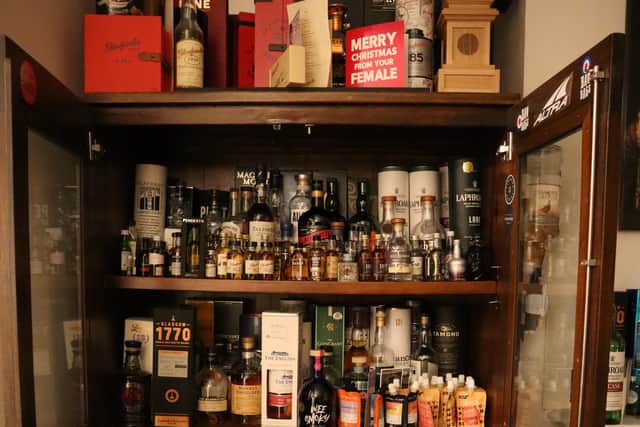 The clan’s Burns Night whisky cabinet. Credit: Claudia Marquis