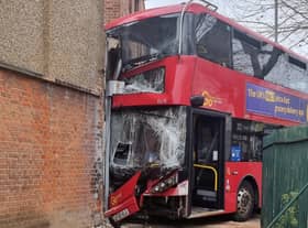 Five people, including three children and two adults, have been taken to hospital after a double-decker bus crashed into a shop in Selwyn Avenue in Highams Park. Credit: SWNS