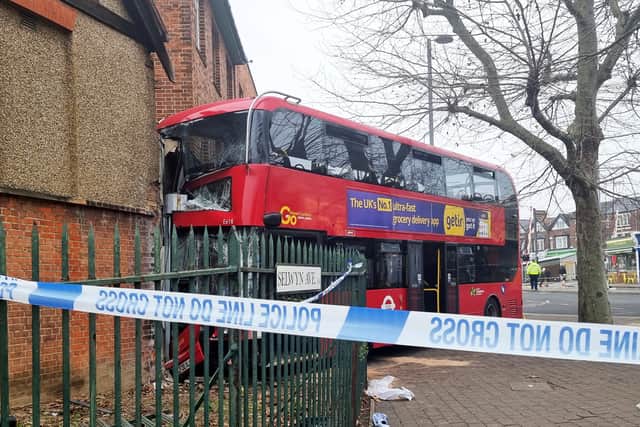 The 212 double-decker bus collided with an end-of-terrace shop with flats above at 8.20am, injuring 19 people most of whom were treated at the scene.  Credit: SWNS