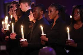 Candle lighting at the UK Holocaust Memorial Day in London in 2020 - the last time in-person events were held. Credit: CHRIS JACKSON/POOL/AFP via Getty Images