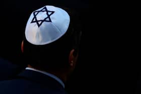 A stock image of a man wearing a kippah - a Jewish skullcap. A teenager denied launching an anti-Semitic attack on two shopkeepers in Stamford Hill, just hours before Holocaust Memorial Day. Credit: RONNY HARTMANN/AFP via Getty Images