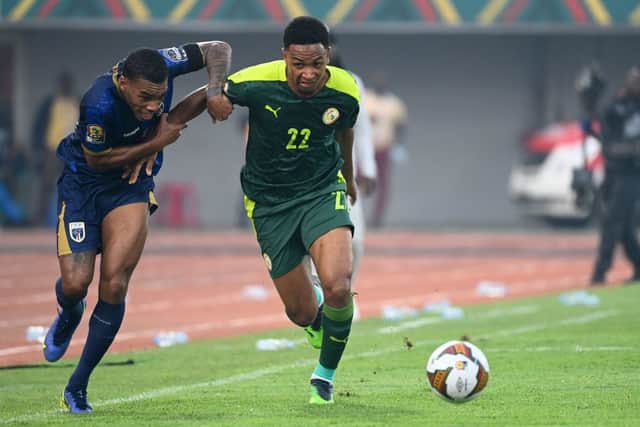 Cape Verde’s forward Garry Mendes Rodrigues (L) challenges Senegal’s defender Abdou Diallo during the Africa Cup of Nations. Credit: PIUS UTOMI EKPEI/AFP via Getty Images 