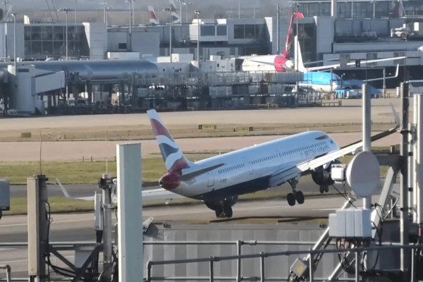 The BA flight touches down before aborting the landing at Heathrow. Credit: SWNS