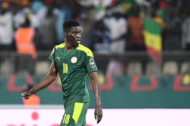 Sarr reacts after scoring his team’s third goal during the Africa Cup of Nations (Photo by CHARLY TRIBALLEAU/AFP via Getty Images)