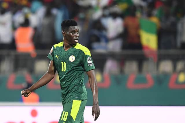  Sarr reacts after   scoring his team’s third goal during the Africa Cup of Nations  (Photo by CHARLY TRIBALLEAU/AFP via Getty Images)