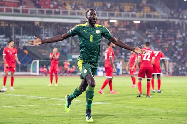 CHEIKHOU KOUYATE celebrates scoring Senegal’s second goal during the Africa Cup  (Photo by Visionhaus/Getty Images)