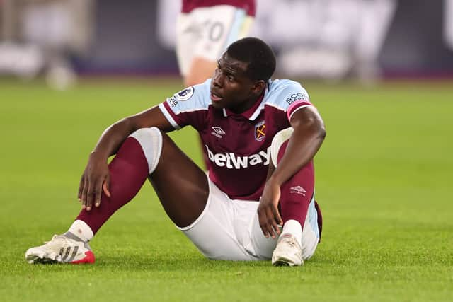 Kurt Zouma of West Ham United looks dejected after  the Premier League match between West Ham United and Watford at London Stadium on February 8, 2022 in London, United Kingdom