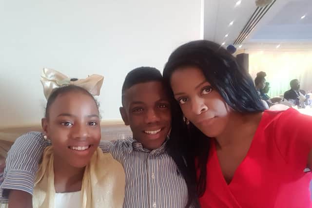 Donovan Allen, centre, with mum Charmaine and sister Denna. Donovan was the first teen to be stabbed to death in London this year. Credit: Allen family
