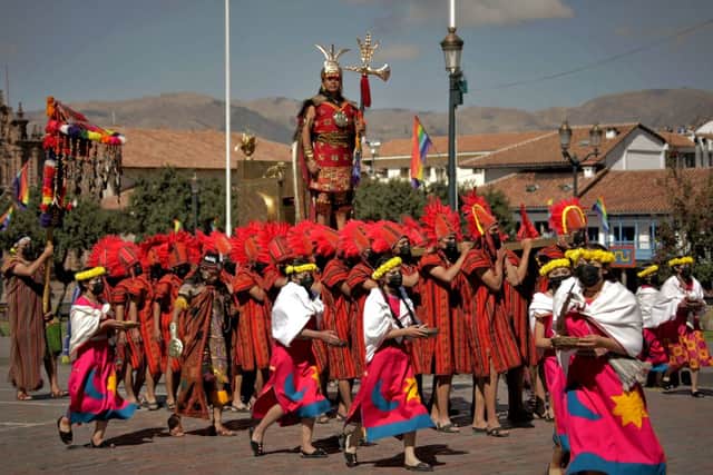 An actor performs as the Inca Emperor, in the recreation of an ancient ritual during the Inti Raymi Festival in Cuzco, Peru. Credit:  JOSE CARLOS ANGULO/AFP via Getty Images