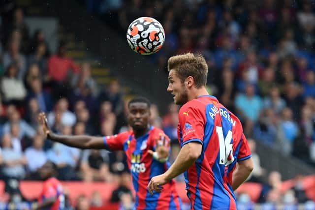 Crystal Palace’s Danish defender Joachim Andersen heads the ball during the English Premier League (Photo by JUSTIN TALLIS/AFP via Getty Images)