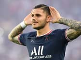 Paris Saint-Germain’s Argentinian forward Mauro Icardi celebrates after scoring a goal during the French L1 football match between Paris Saint-Germain and Racing Club Strasbourg at the Parc des Princes stadium in Paris on August 14, 2021
